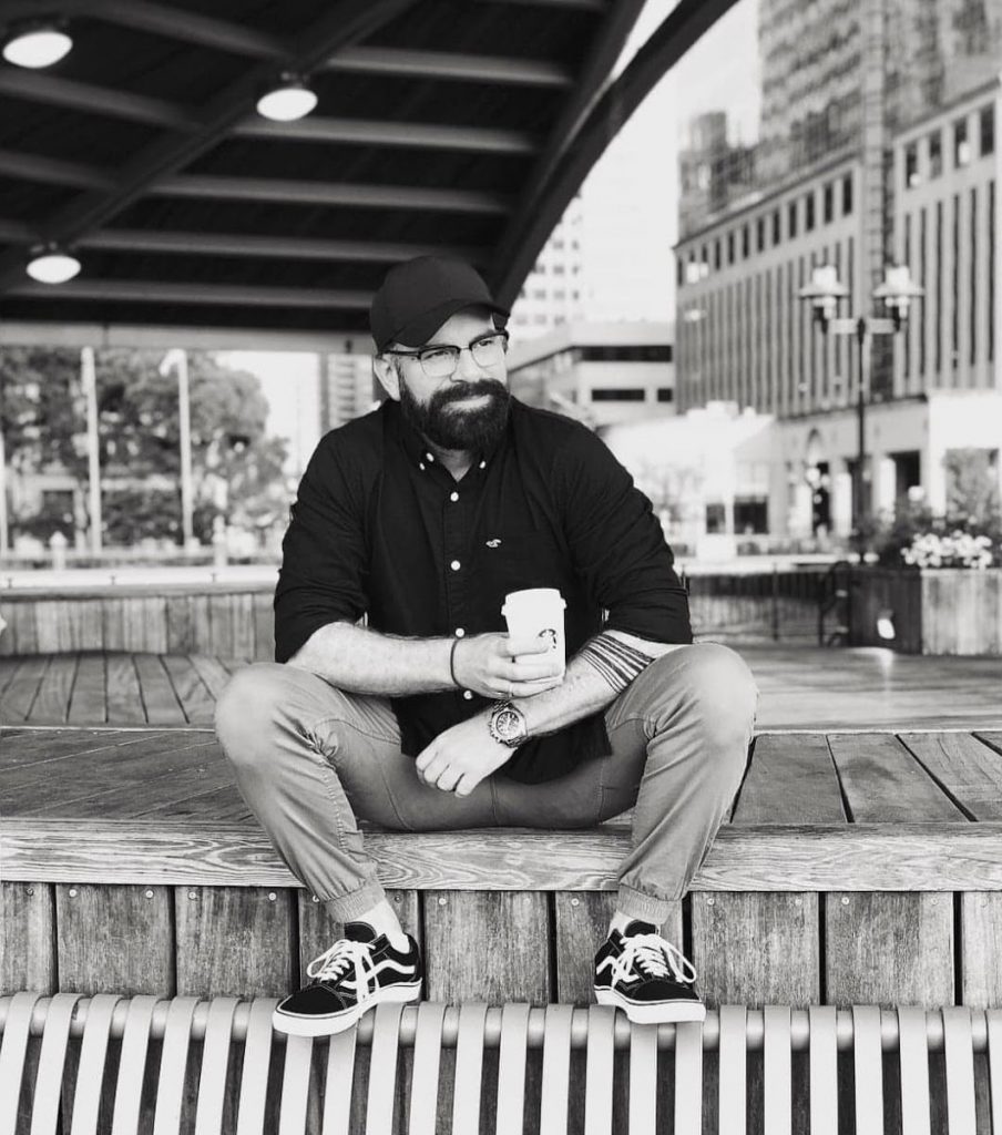 Man holding coffee cup